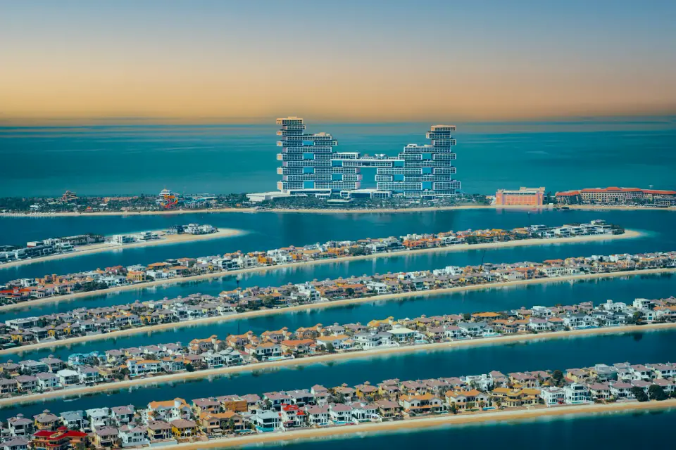 Palm Jumeirah fronds and Atlantis The Royal at golden hour